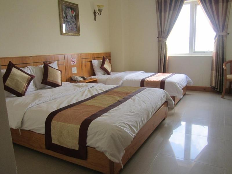 Monaco Hotel Da Nang Quarto foto